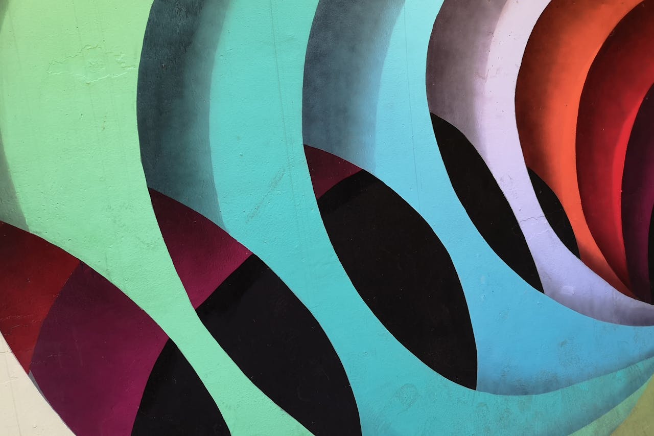 Colorful abstract wall art with geometric shapes and vibrant colors.
